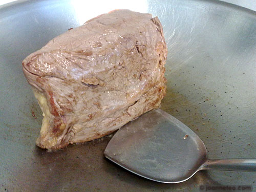 Sealing beef in pan Sealing beef in pan