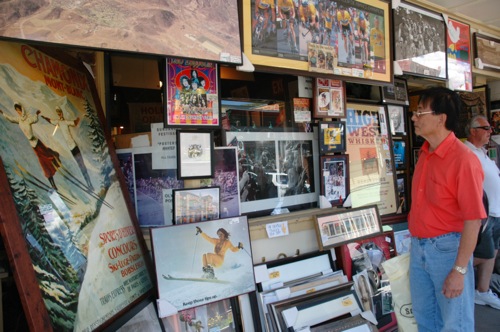 Looking at posters in Park City Looking at posters in Park City