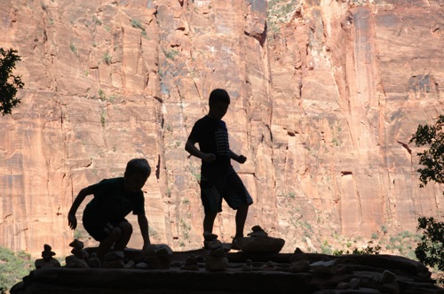 Children playing on rock Children playing on rock