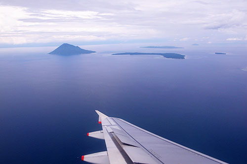 Bunaken Marine National Park from the air. Bunaken Marine National Park from the air. The pointy one is a typical cone-shaped volcano, the dormant Pulau Manado Tua.