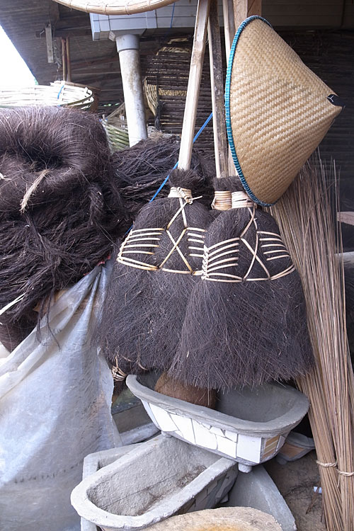 Indoor and outdoor brooms made of parts of the coconut tree. Indoor and outdoor brooms made of parts of the coconut tree.