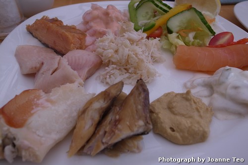 Clockwise: Shrimp Salad, Cold Smoked Salmon, Herring in Yogurt, Hummus, Hot Smoked Mackerel, Crab Claw, Smoked Trout, Hot Smoked Salmon. Crab in centre. Clockwise: Shrimp Salad, Cold Smoked Salmon, Herring in Yogurt, Hummus, Hot Smoked Mackerel, Crab Claw, Smoked Trout, Hot Smoked Salmon. Crab in centre.