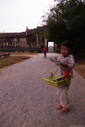 Kids selling postcards at Angkor Wat.