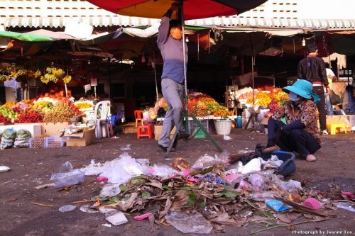 Clearing the mess from yesterday's market to begin business today.